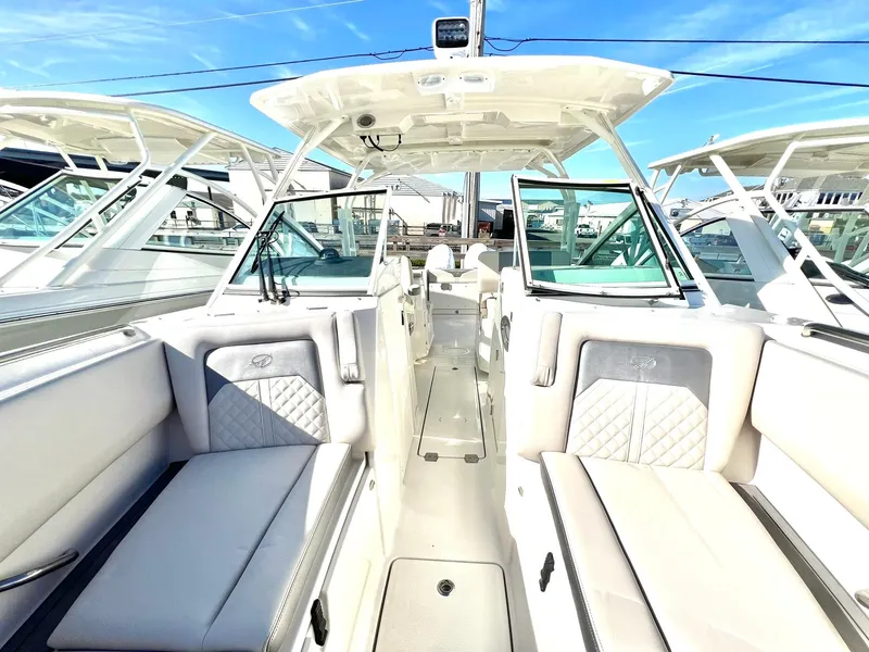 Slide: The Image of 2025 Sailfish 276 DC boat interior with spacious seating and modern design. - 7