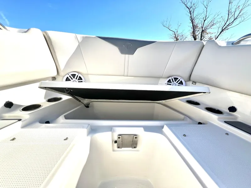 Slide: The Image of 2025 Sailfish 276 DC boat interior with seating and storage compartments. - 9