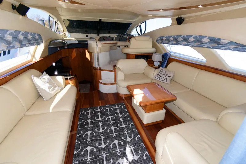 Slide: The Image of Luxurious 2005 Azimut 50 Flybridge yacht interior with elegant seating and nautical decor. - 18