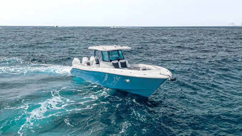 Slide: The Image of 2025 HCB 39 Speciale boat cruising on open ocean waters. - 1