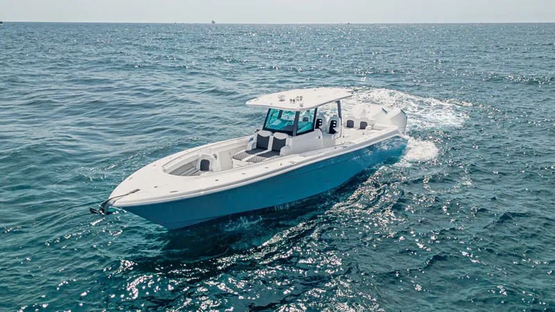 Slide: The Image of 2025 HCB 39 Speciale boat cruising on open ocean waters. - 2