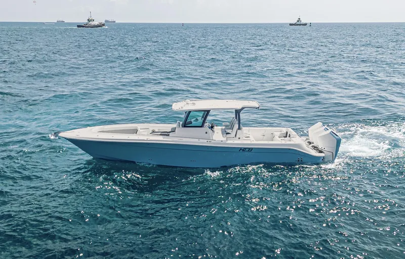Slide: The Image of 2025 HCB 39 Speciale boat cruising on open sea. - 21