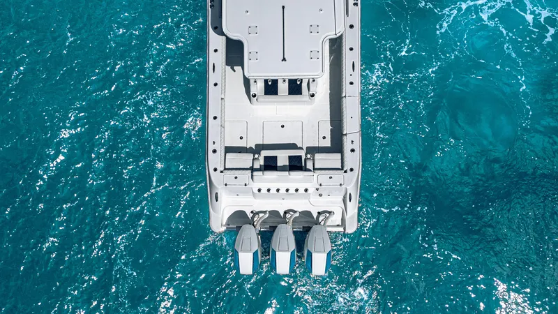 Slide: The Image of Aerial view of 2025 HCB 39 Speciale boat on turquoise water. - 3