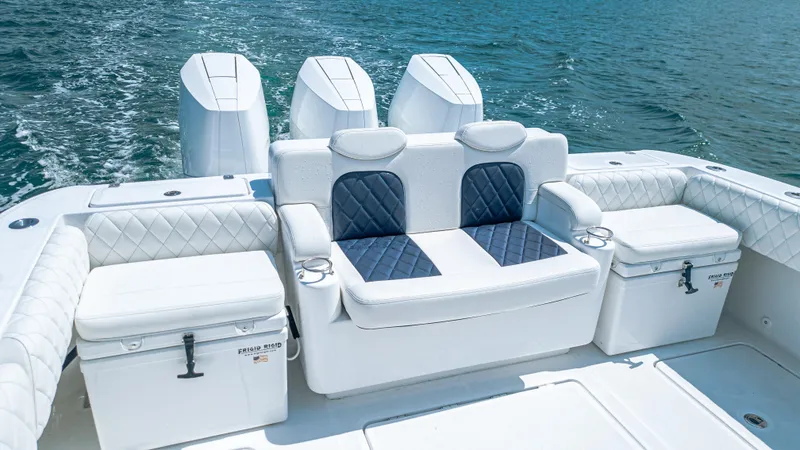 Slide: The Image of 2025 HCB 39 Speciale boat interior with luxurious seating and powerful engines. - 8
