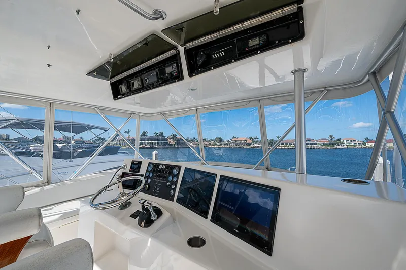 Slide: The Image of 1999 Post 50 Convertible yacht helm with panoramic water view. - 35