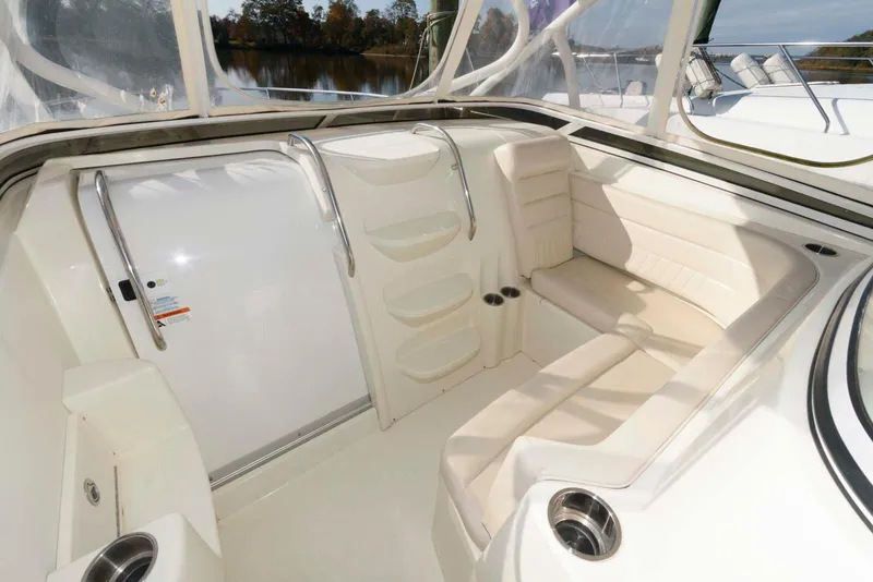 Slide: The Image of 2008 Hydra-Sports Vector 3500 VX boat interior with white seating and cup holders. - 10
