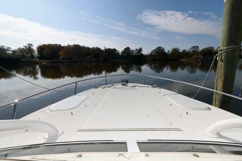 Slide: The Image of 2008 Hydra-Sports Vector 3500 VX boat on calm water with scenic shoreline. - 11