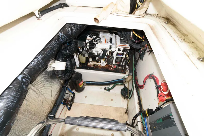 Slide: The Image of Engine compartment of 2008 Hydra-Sports Vector 3500 VX boat, showcasing mechanical components. - 15