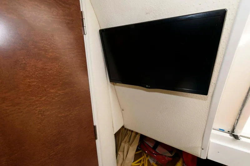 Slide: The Image of 2008 Hydra-Sports Vector 3500 VX cabin interior with mounted flat-screen TV. - 19