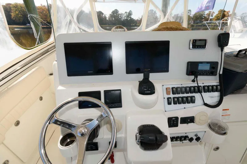Slide: The Image of 2008 Hydra-Sports Vector 3500 VX helm with dual screens and control panel. - 9