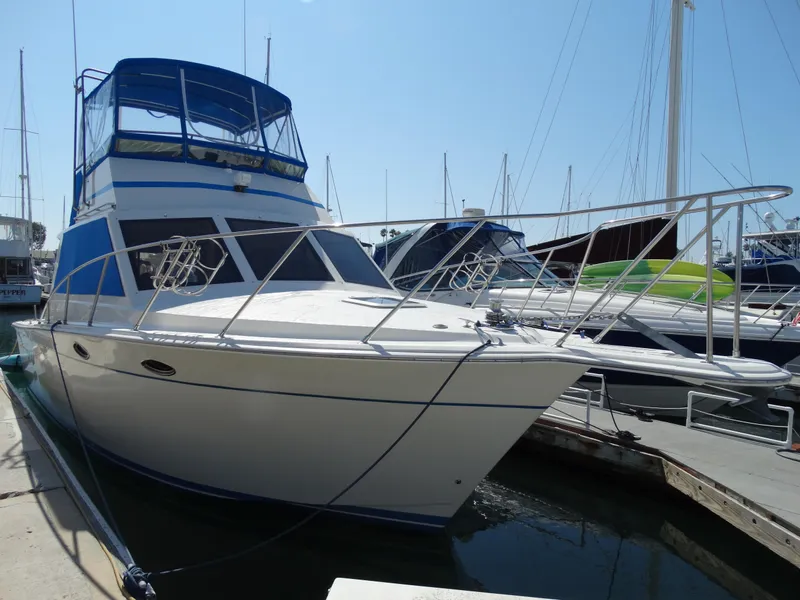 The Image of 1991 Egg Harbor 33 Sedan docked at marina. - 0