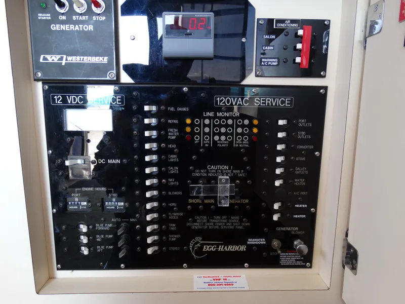 Slide: The Image of Electrical panel of a 1991 Egg Harbor 33 Sedan boat. - 11