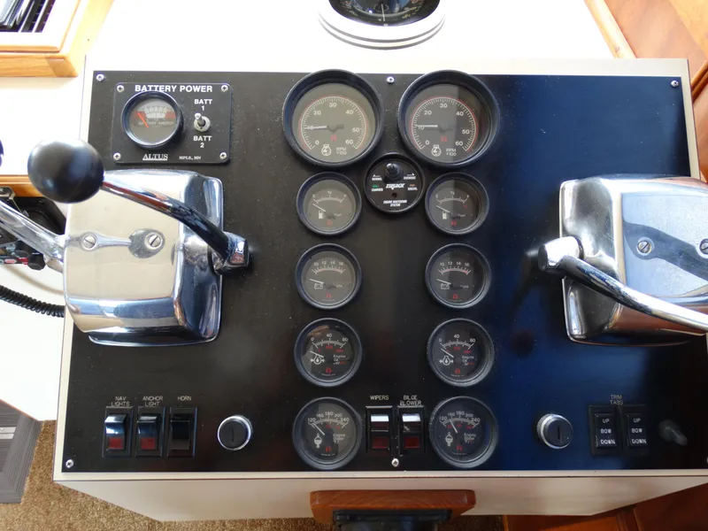 Slide: The Image of Dashboard of a 1991 Egg Harbor 33 Sedan boat. - 23