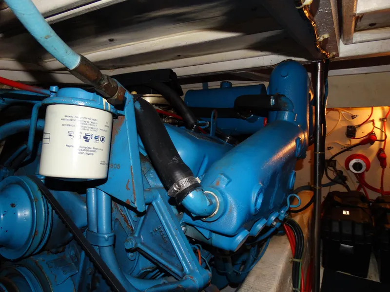 Slide: The Image of Engine room of a 1991 Egg Harbor 33 Sedan boat. - 32