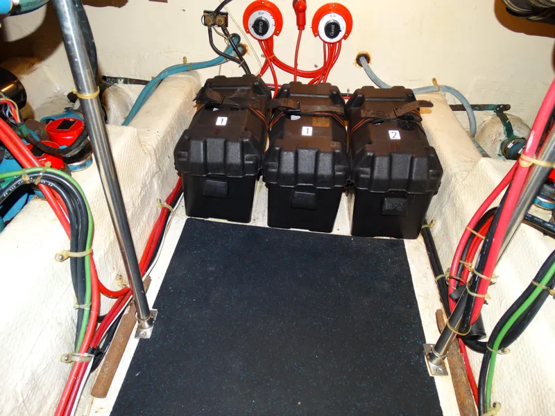 Slide: The Image of Battery compartment of a 1991 Egg Harbor 33 Sedan boat. - 34