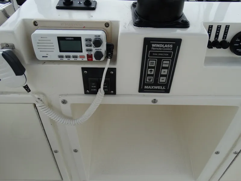 Slide: The Image of 1991 Egg Harbor 33 Sedan console with radio and windlass control. - 36