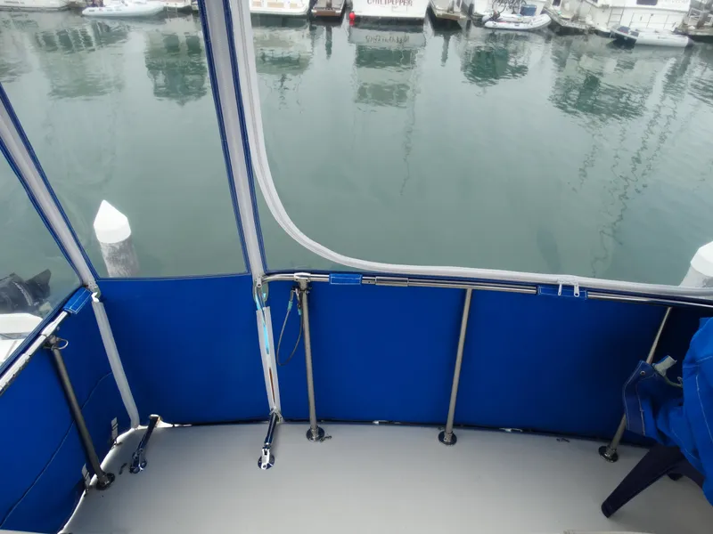 Slide: The Image of Interior view of 1991 Egg Harbor 33 Sedan yacht with blue trim. - 40