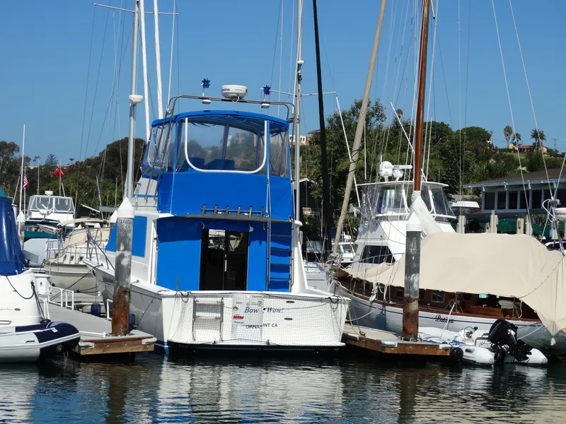 Slide: The Image of 1991 Egg Harbor 33 Sedan docked in marina. - 5