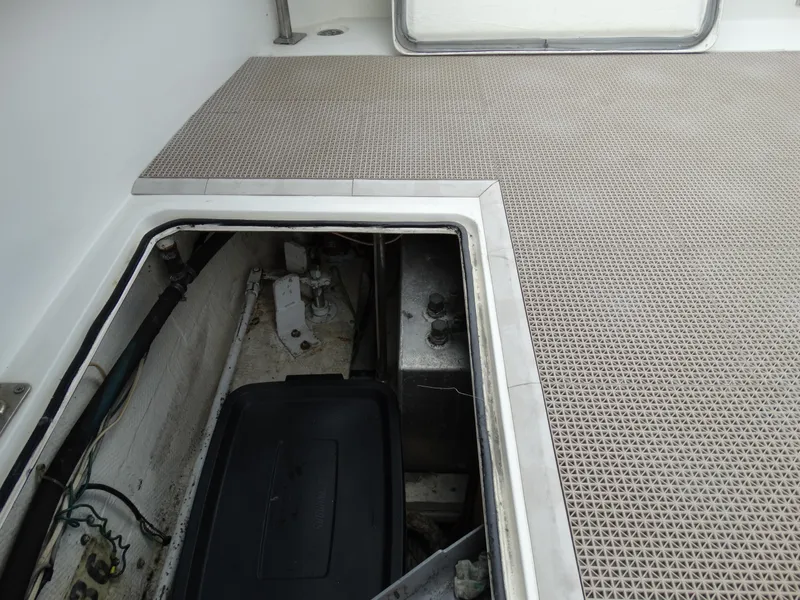 Slide: The Image of Open storage compartment on a 1991 Egg Harbor 33 Sedan boat. - 8