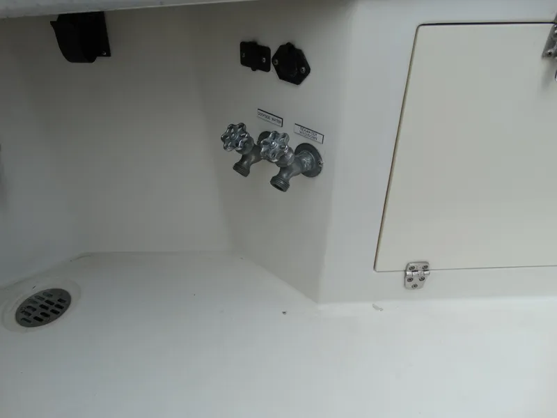 Slide: The Image of Faucets and drain on Egg Harbor 33 Sedan, 1991 model. - 9