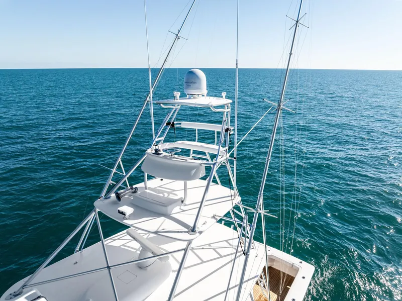 Slide: The Image of 2007 Viking 52 Open yacht on open sea, showcasing tower and ocean view. - 17