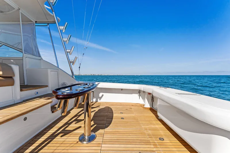 Slide: The Image of 2007 Viking 52 Open yacht deck with ocean view and clear blue sky. - 24