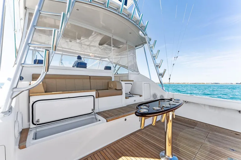Slide: The Image of 2007 Viking 52 Open yacht interior with seating and fishing equipment. - 27