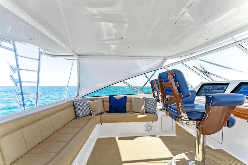Slide: The Image of Interior of 2007 Viking 52 Open yacht with seating and helm, ocean view. - 33