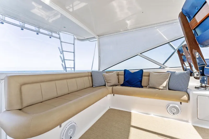 Slide: The Image of Luxurious seating area on a 2007 Viking 52 Open yacht with cushions and ocean view. - 35