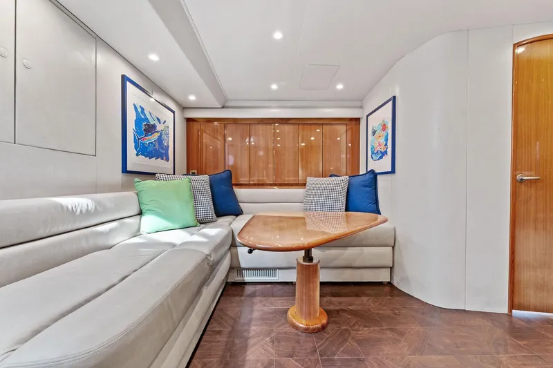 Slide: The Image of Interior of 2007 Viking 52 Open yacht with plush seating and wooden table. - 43