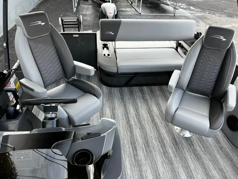 Slide: The Image of 2025 Bennington S 22 boat interior with modern seating and steering console. - 12