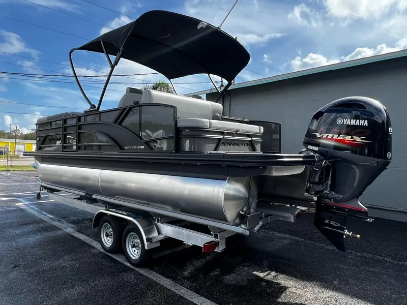 Slide: The Image of 2025 Bennington S 22 pontoon boat with Yamaha VMAX engine on trailer. - 6
