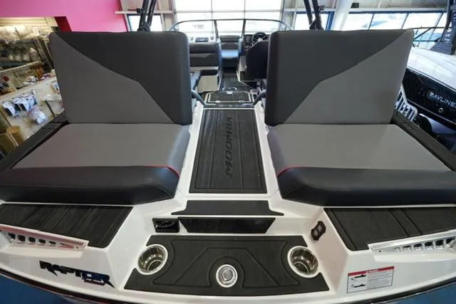 Slide: The Image of 2025 Moomba Mojo boat interior with dual seating and modern design. - 17