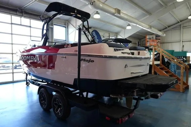 Slide: The Image of 2025 Moomba Mojo boat in showroom, featuring sleek design and modern features. - 4