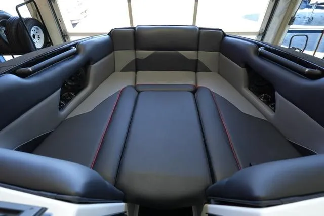 Slide: The Image of 2025 Moomba Mojo boat interior with sleek, modern seating design. - 6