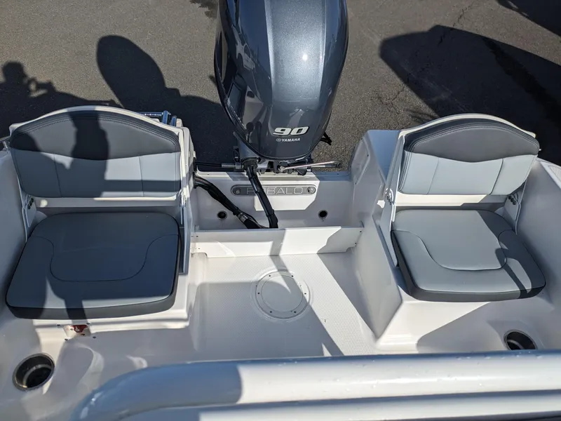Slide: The Image of 2025 Robalo R160 boat with dual seats and Yamaha 90 engine. - 9