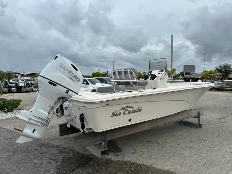 Slide: The Image of 2025 Sea Chaser 21 LX boat with Suzuki outboard motor on display. - 13