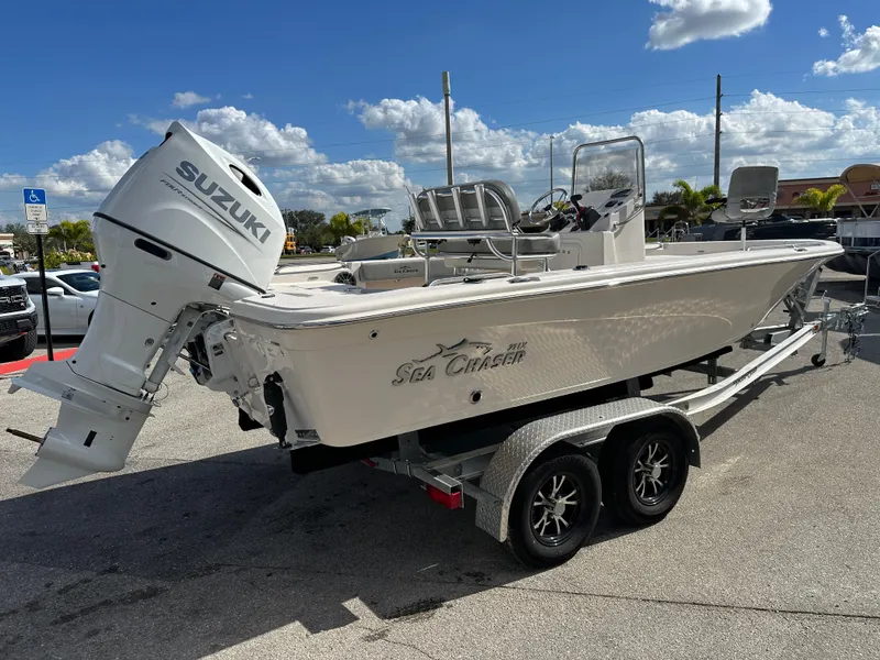 Slide: The Image of 2025 Sea Chaser 21 LX boat on trailer with Suzuki outboard motor. - 5