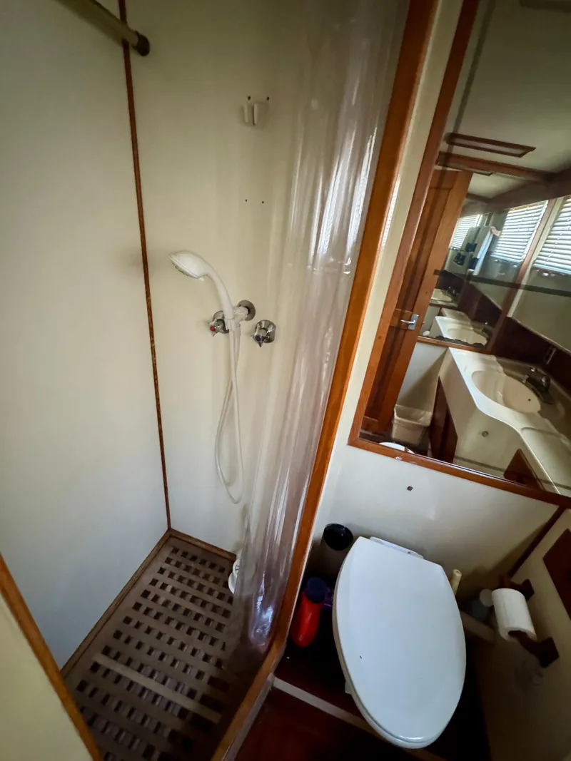 Slide: The Image of 1979 Grand Banks Classic yacht bathroom with shower and toilet. - 35