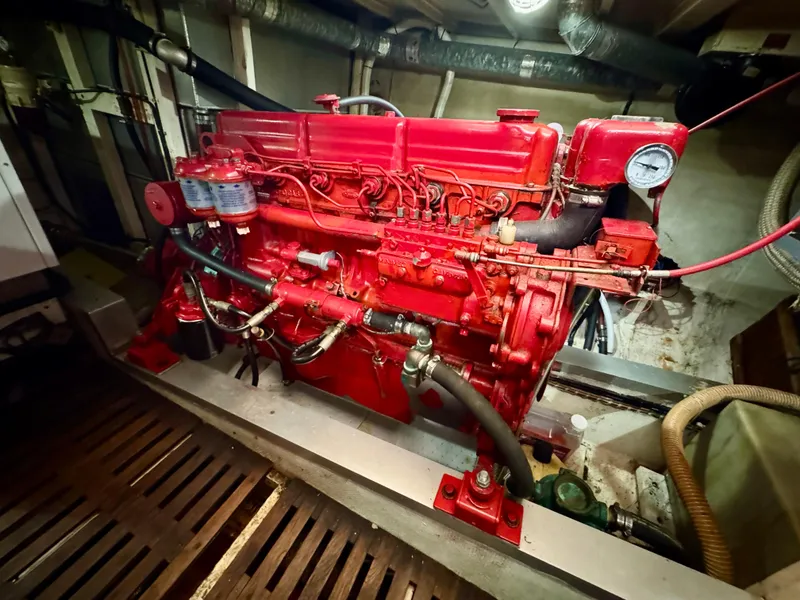 Slide: The Image of Red engine in a 1979 Grand Banks Classic boat, detailed view. - 44