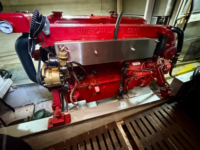 Slide: The Image of Red American Diesel engine in a 1979 Grand Banks Classic boat. - 45