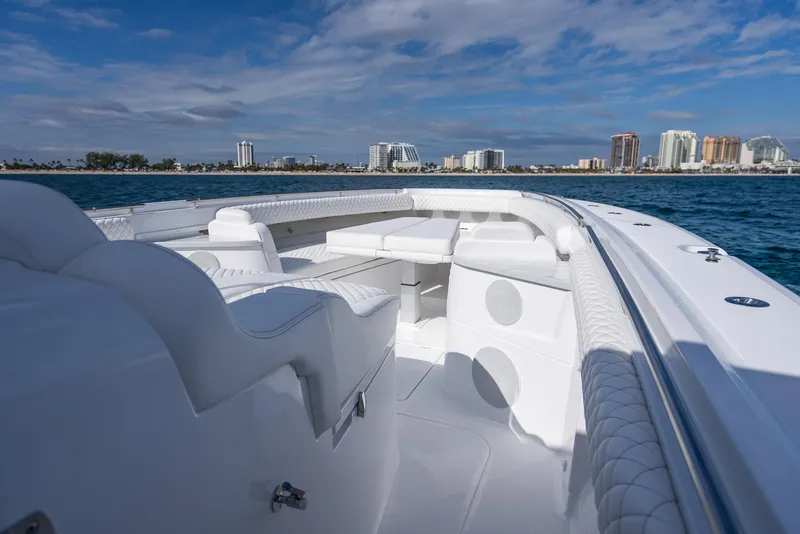 Slide: The Image of 2025 HCB 53 Sueños luxury boat interior with ocean and city skyline. - 21