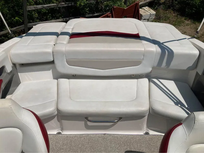 Slide: The Image of 2013 Chaparral 196 SSi boat interior with white and red seating. - 6