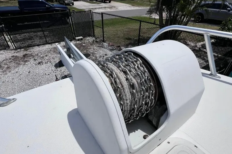 Slide: The Image of Anchor chain mechanism on 2005 Twin Vee 22 Ocean Classic boat deck. - 12