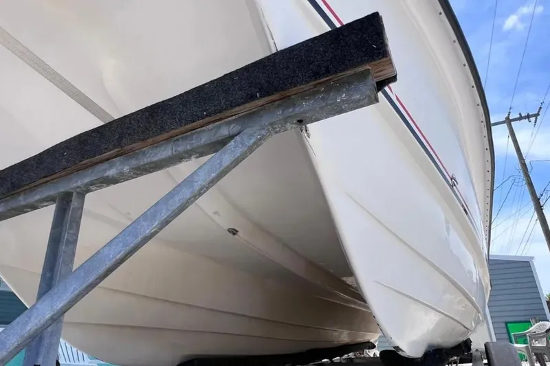 Slide: The Image of 2005 Twin Vee 22 Ocean Classic boat on trailer, viewed from below. - 15