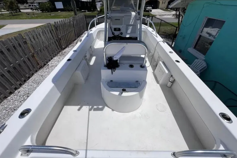 Slide: The Image of 2005 Twin Vee 22 Ocean Classic boat interior with spacious deck and center console. - 8