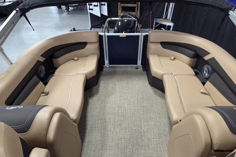Slide: The Image of 2025 Barletta Cabrio 22QC interior with tan leather seating and spacious layout. - 11
