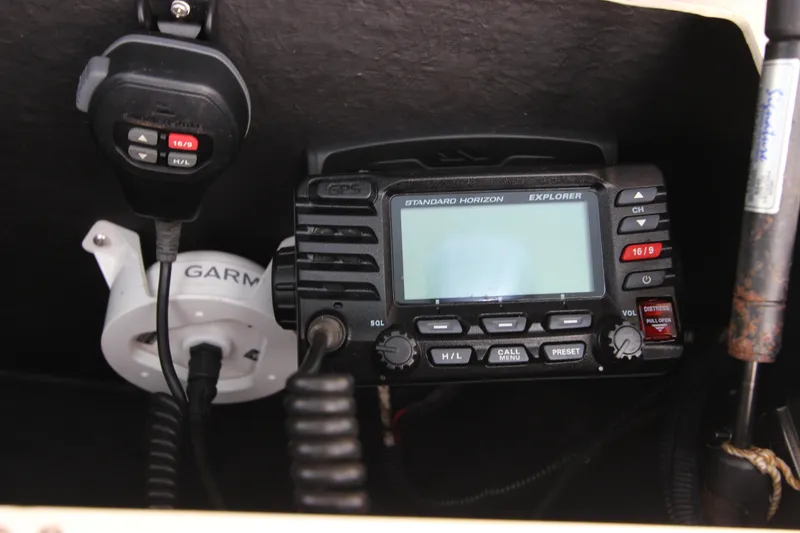 Slide: The Image of Standard Horizon Explorer radio on 2015 Grady-White 251 Coastal Explorer boat. - 21