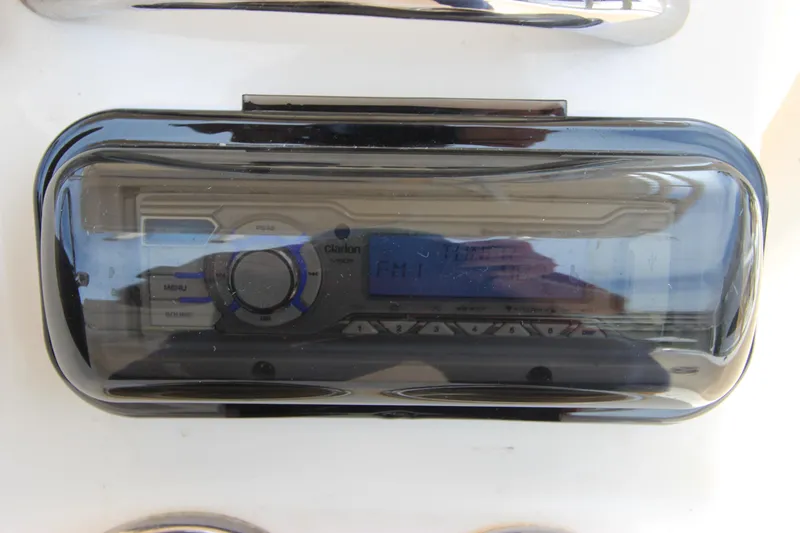 Slide: The Image of Clarion marine stereo system on 2015 Grady-White 251 Coastal Explorer boat. - 22