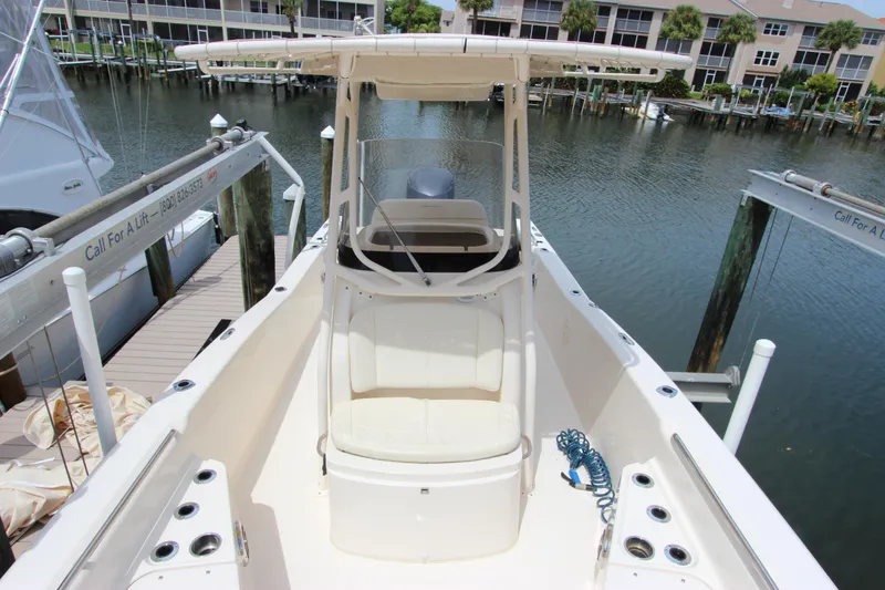 Slide: The Image of 2015 Grady-White 251 Coastal Explorer boat docked in marina. - 31